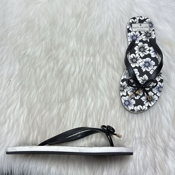 Kate Spade Nova NWOT Black/White Floral Footpad Flip Flops Sz 7 - Picture 1 of 6
